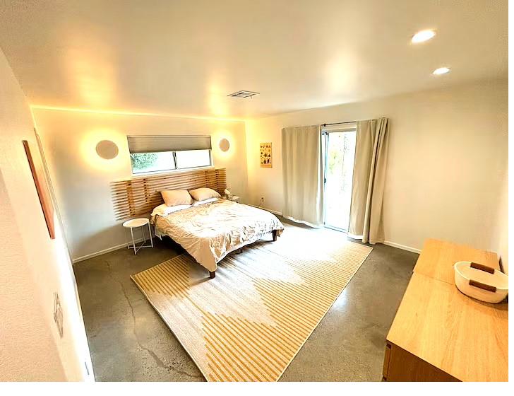 Master bedroom with warm lighting