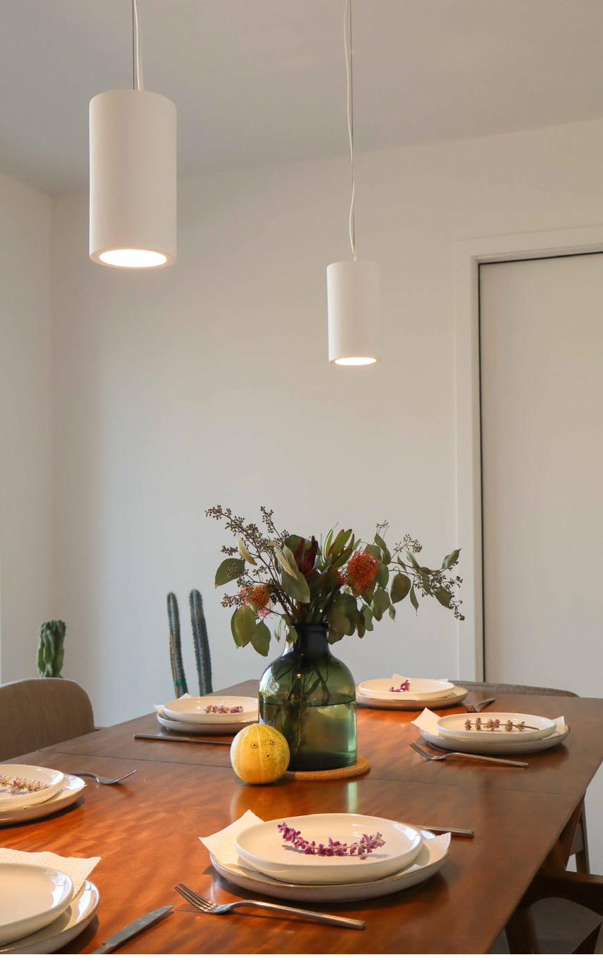 Dining table set for dinner